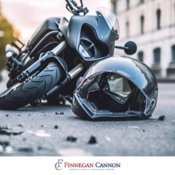 A helmet sits on the ground next to a motorcycle after a motorcycle accident in Sliver Springs, MD